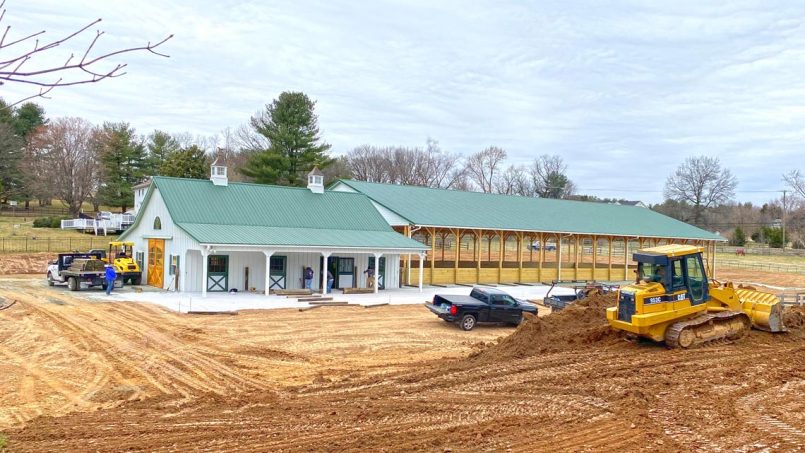 Horse arena with attached barn nearly finished, back view