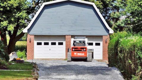 Preparing a gravel base for concrete driveway