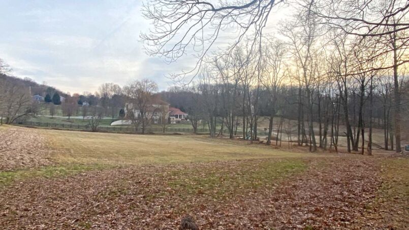 Athletic field space before excavation was open but sloped