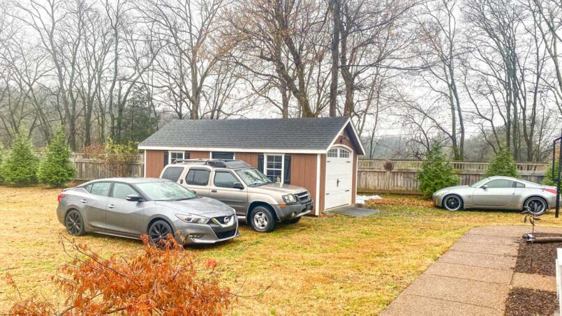Before project cars parked on grass