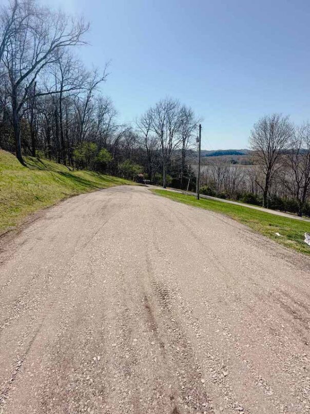 The driveway leading to the pole barn