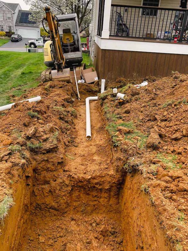 Drainage pipes are installed to redirect water