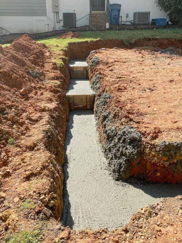 The initial layer of concrete